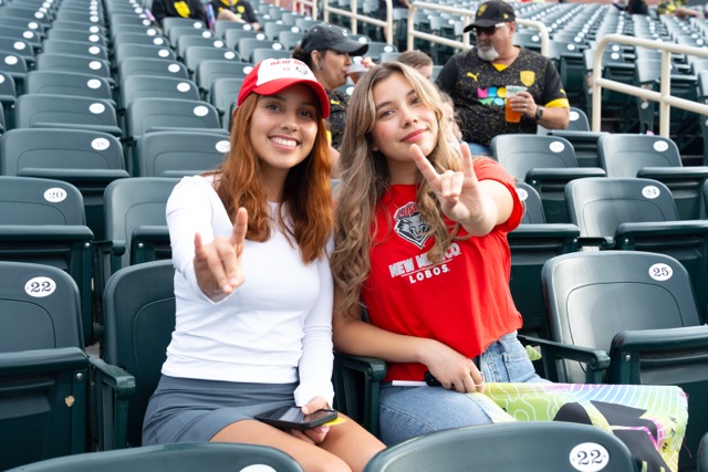 Two students hold up a 