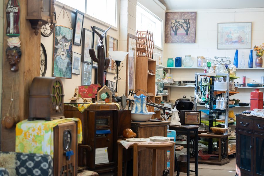 The interior of Hey Mavis! Thrift Store shows a variety of second-hand items.
